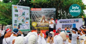 Warga Perumahan Vila Nusa Indah Ramai-Ramai Gelar Aksi Desak Percepatan Normalisasi Sungai