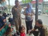 Satpol PP Sisir Pengemis Bawa Anak di Perlintasan Kereta Setiamekar Tambun